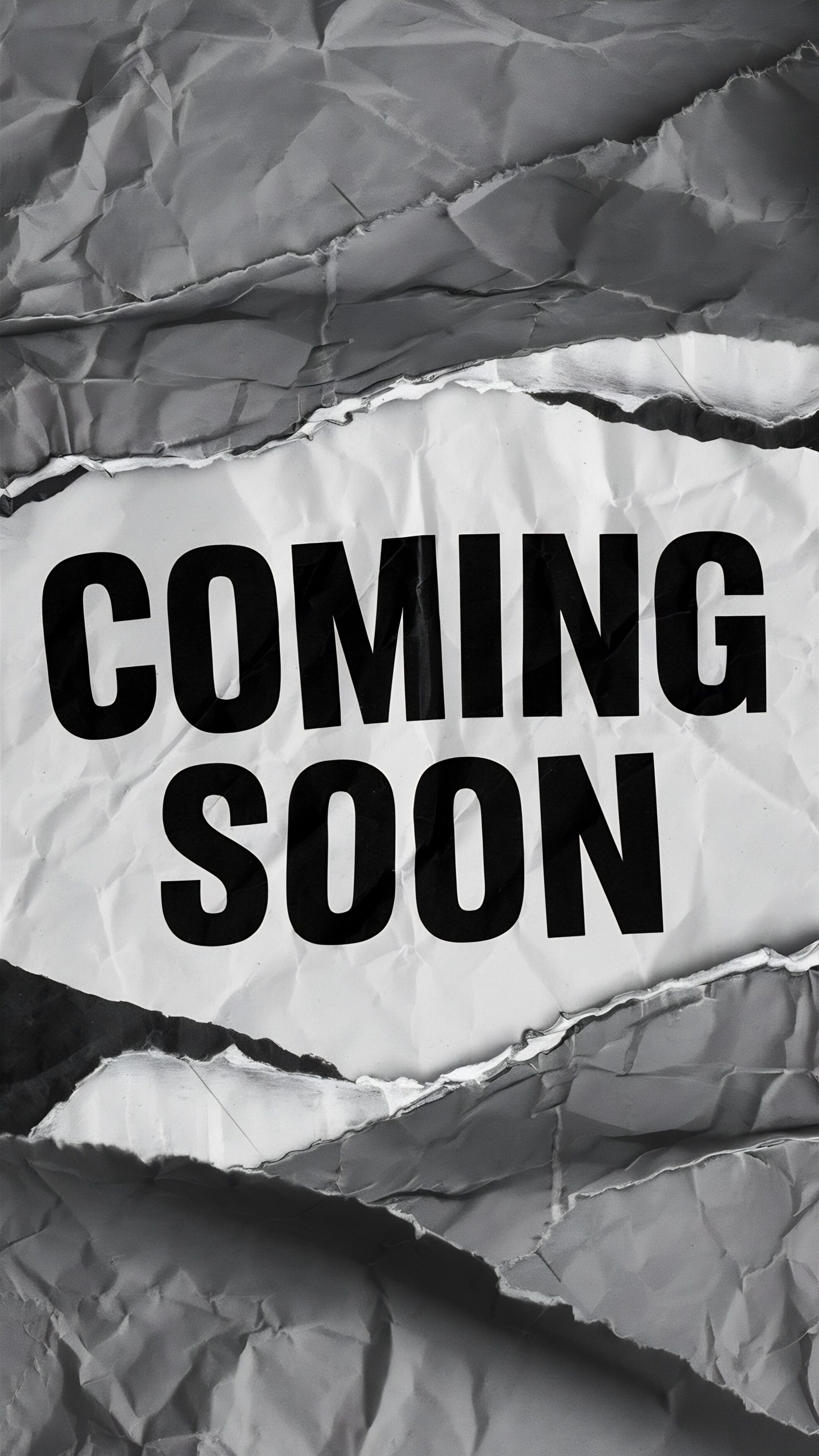 coming-soon-message-torn-paper